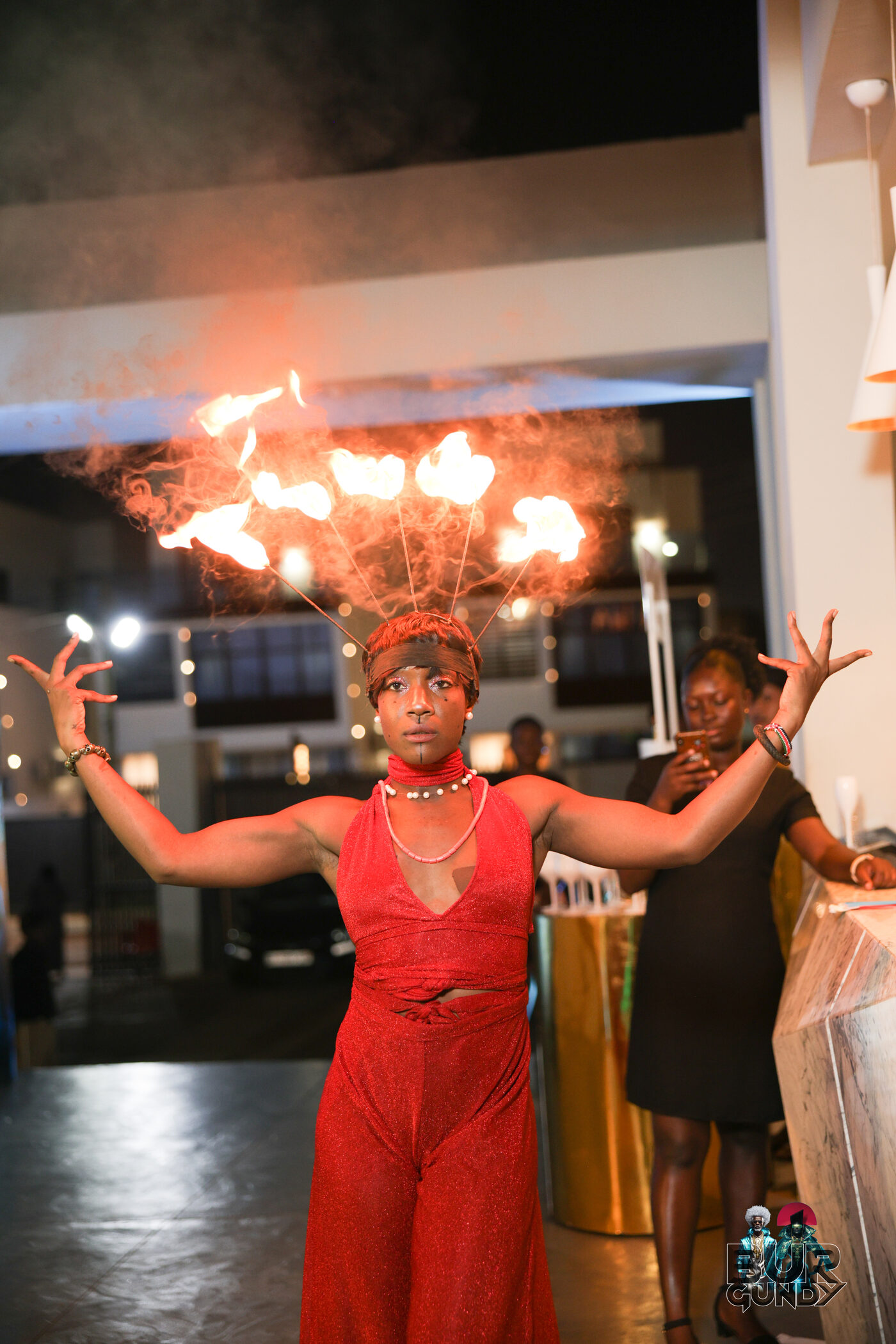 Fire dancer performance at Aura Clubhouse