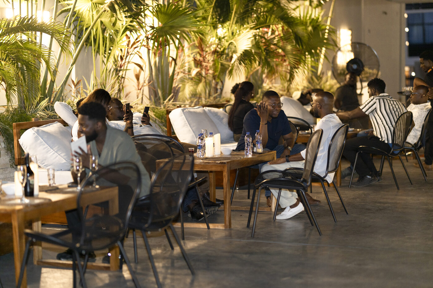 Aura Clubhouse outdoor terrace at night